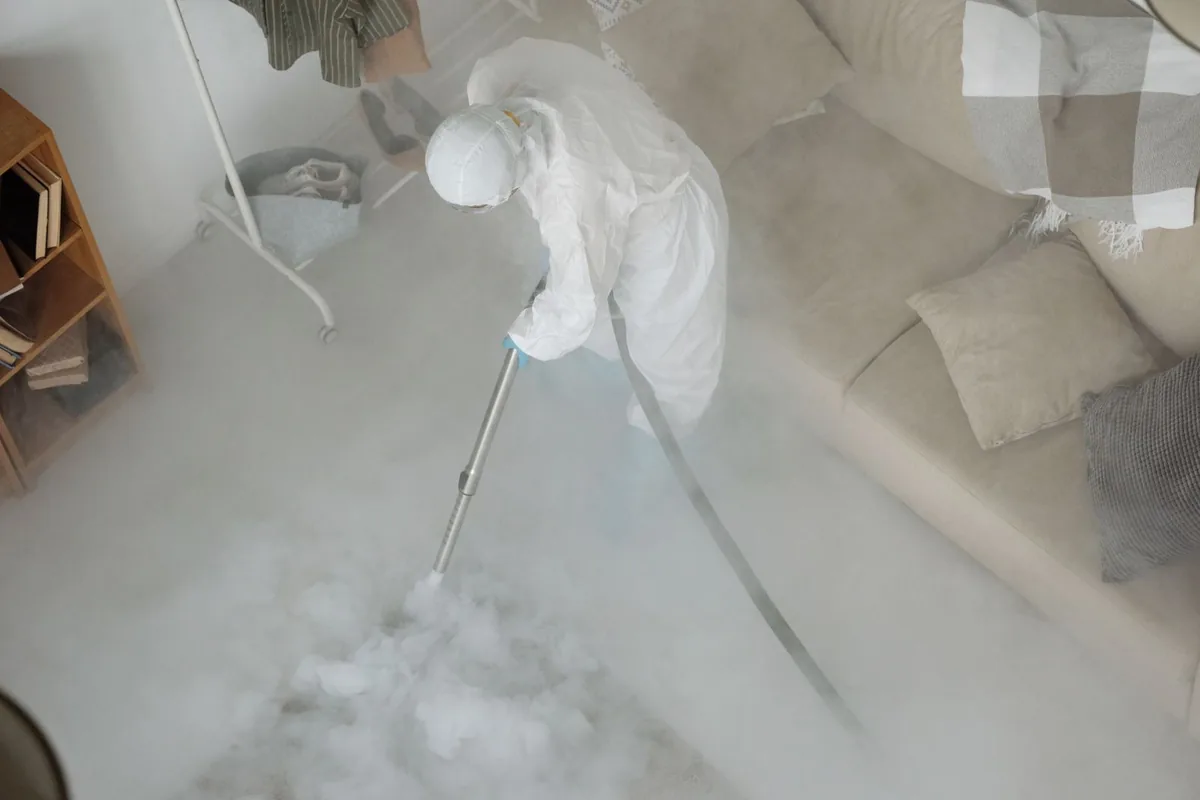 Biohazard cleanup technician in protective equipment, Pemberton Heights, NJ